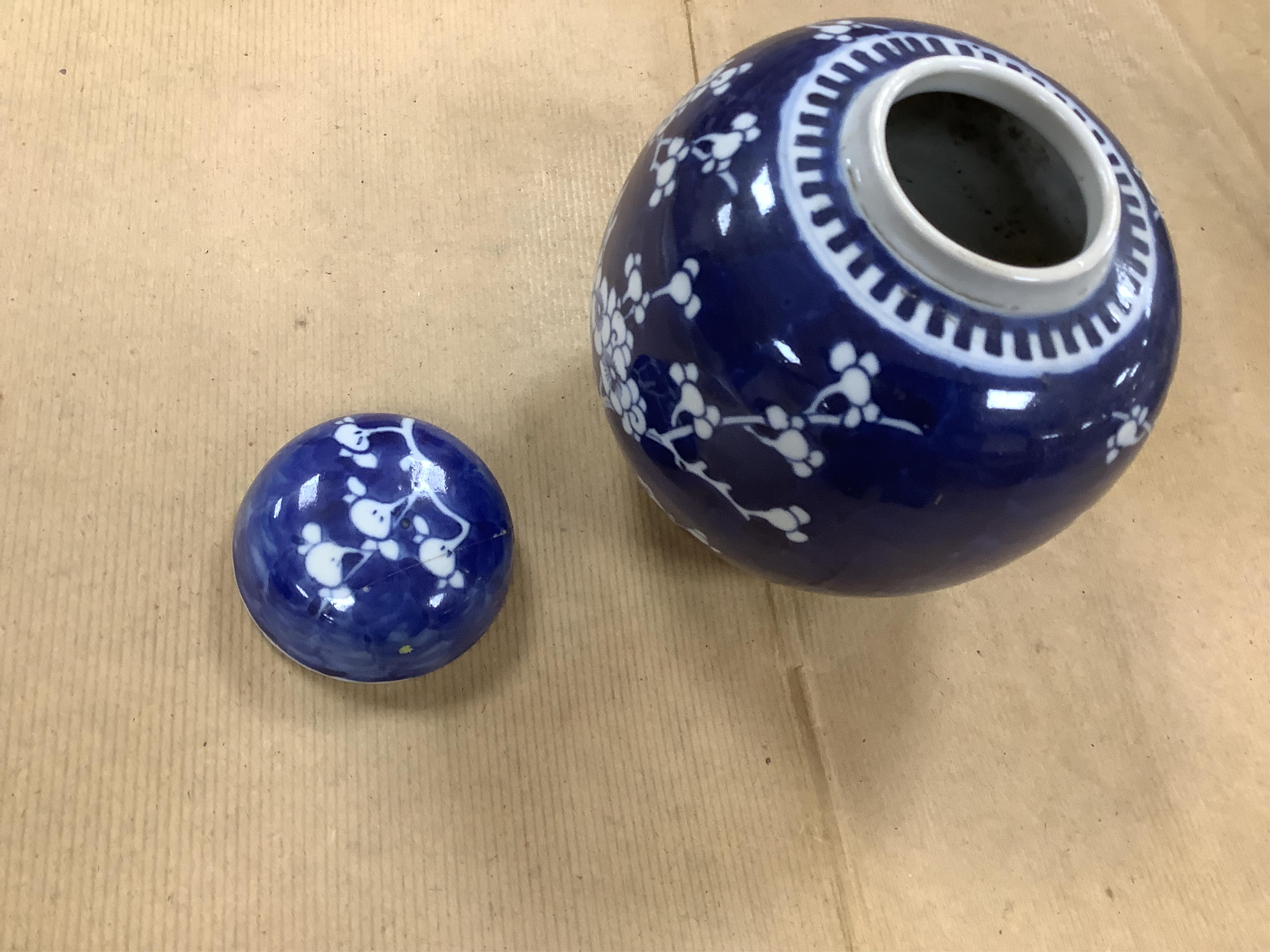 Six Chinese blue and white ginger jars, of varying height, one with a cover. Jar and cover 15cm high. Condition - fair